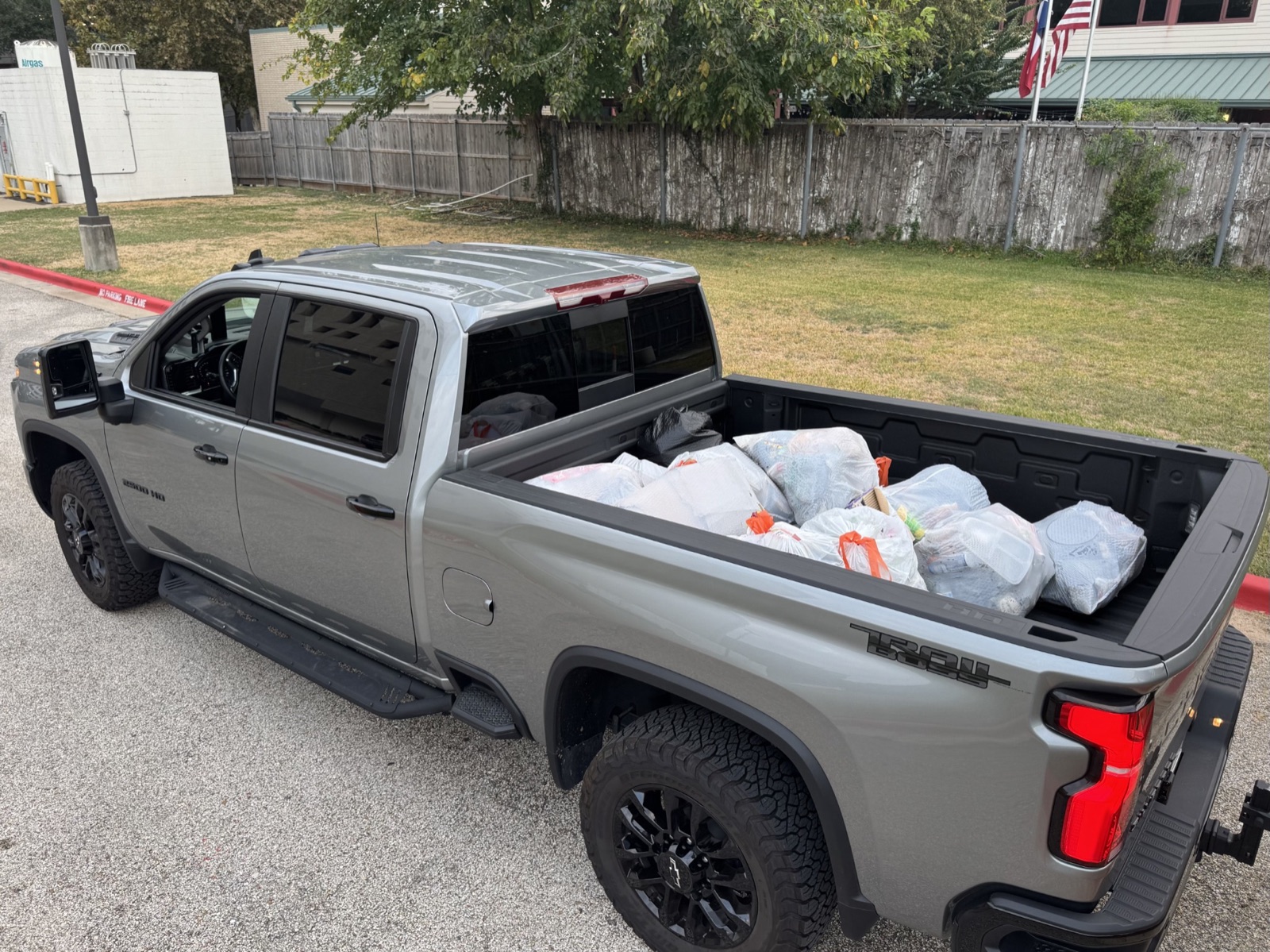 Collected bags in the bed of the outreach truck